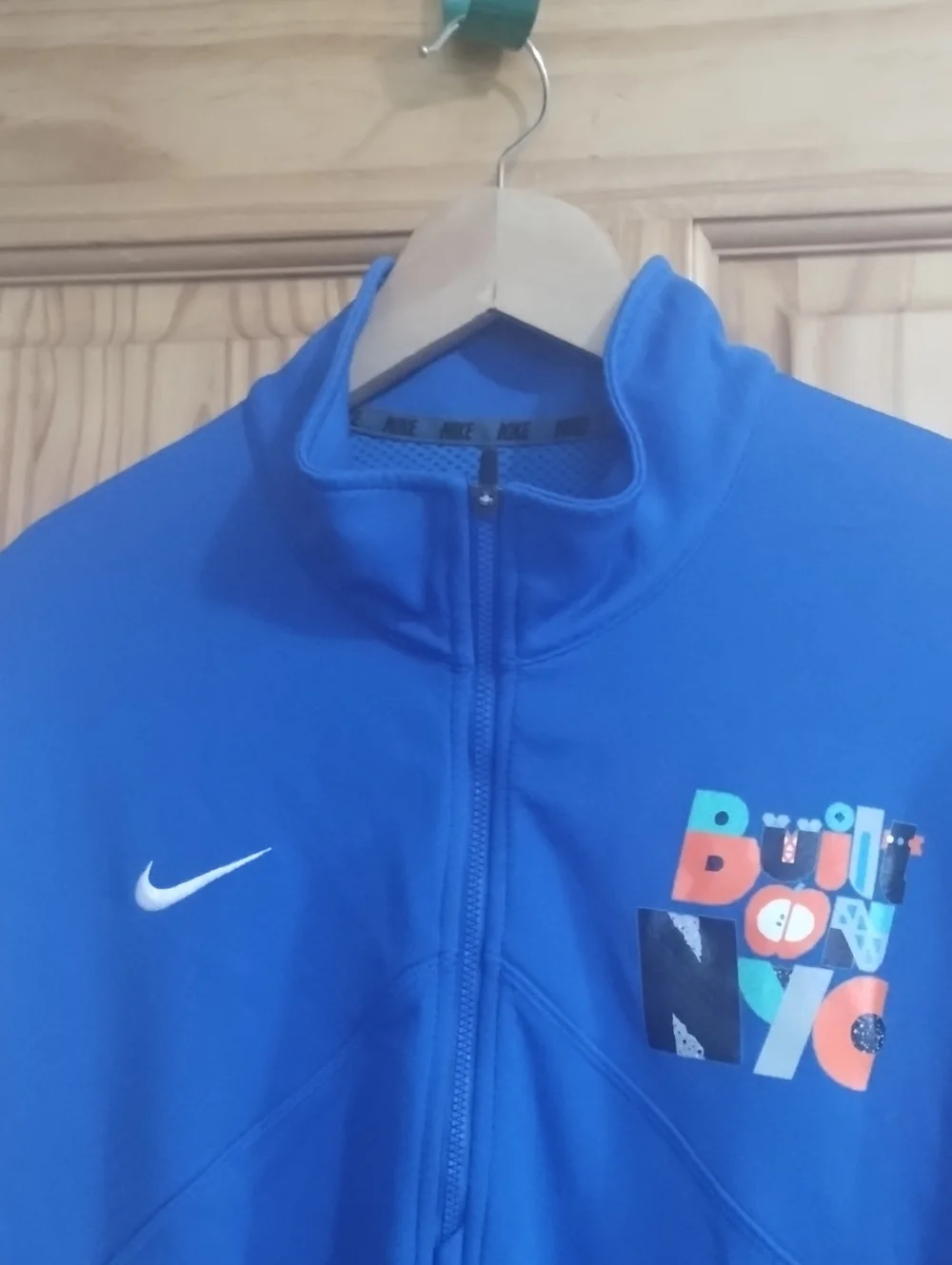 Nike Blue Quarter-Zip Pullover with Multicolor Chest Graphic